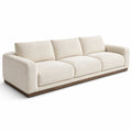 Canapé 3 places en tissu beige avec base en bois